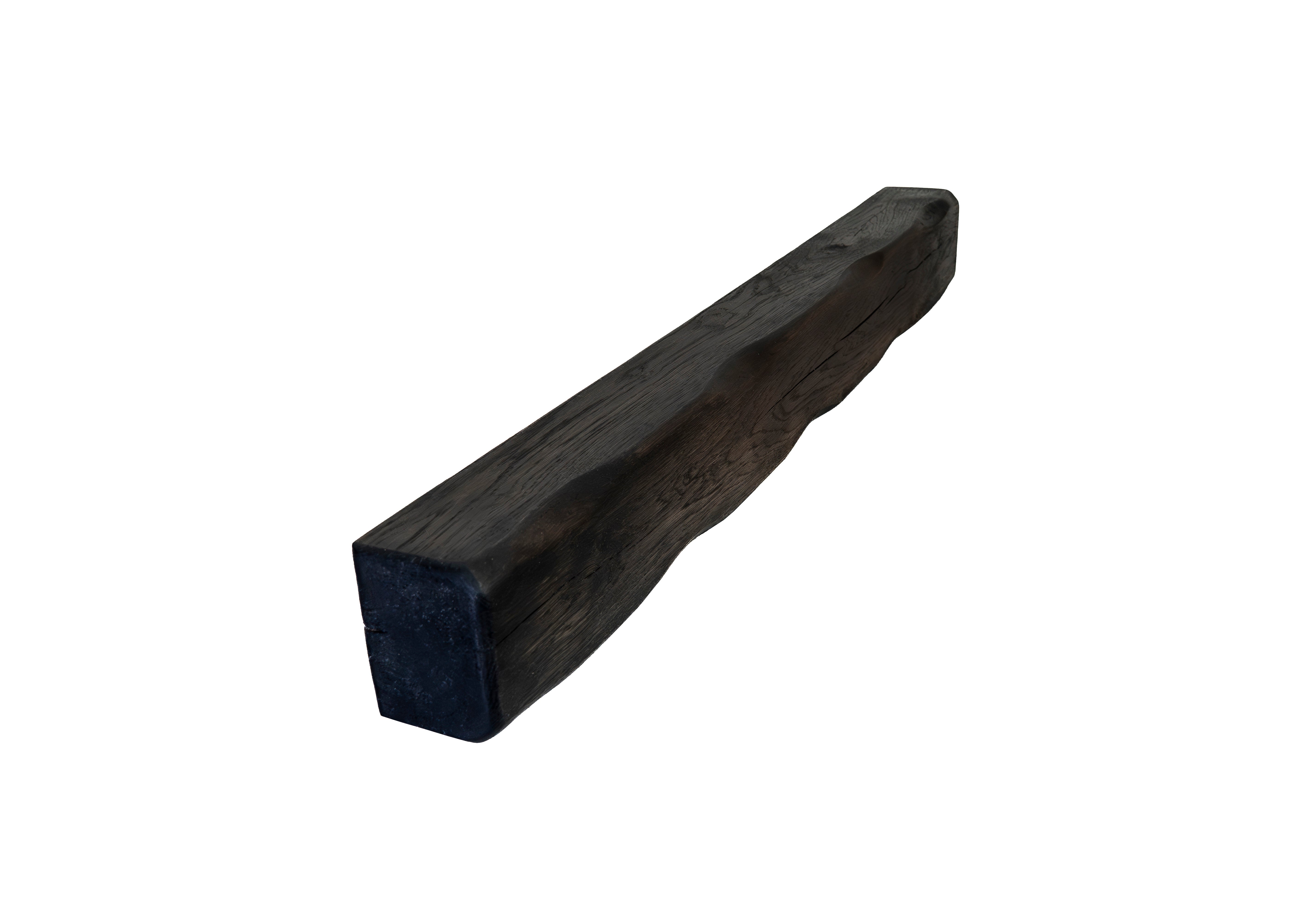 Black rectangular wooden beam on a white background