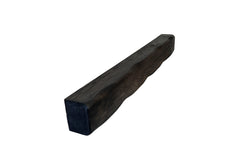 Black rectangular wooden beam on a white background