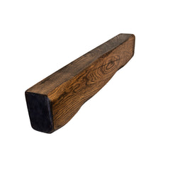 Wooden beam with a dark finish on a white background
